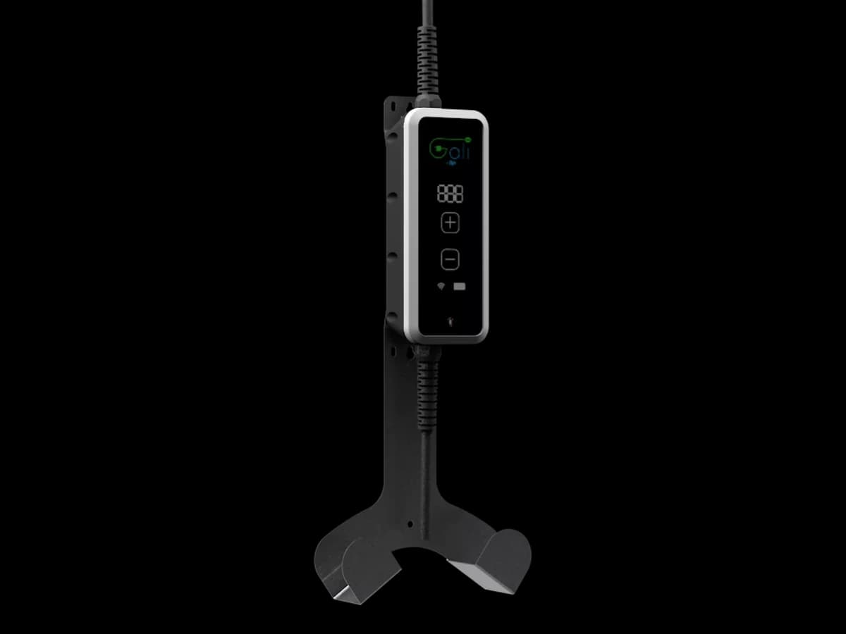 GALI BC in its wall-mounting bracket, with the charging cable